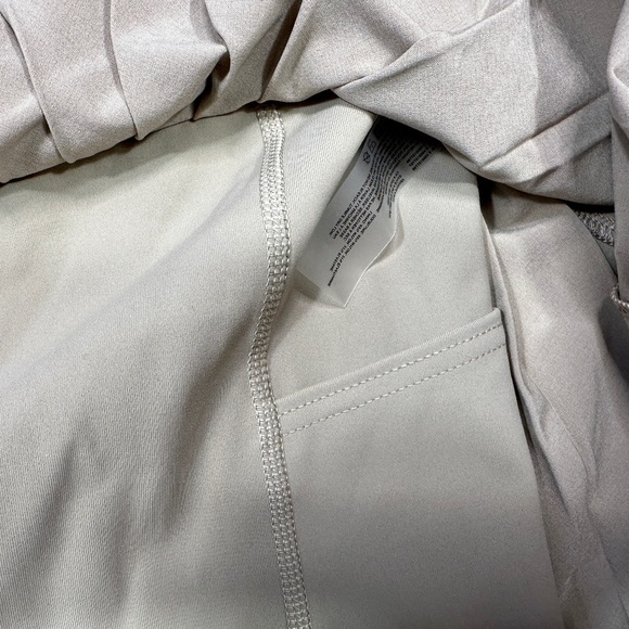 Aritizia TnAction TnaMove Tennis ProMicro pleated high rise Skirt Tan Size L - Picture 8 of 10